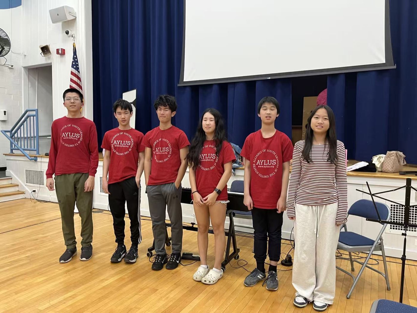 Volunteers performing keyboard and mallet percussion for students at Pillar Elementary School